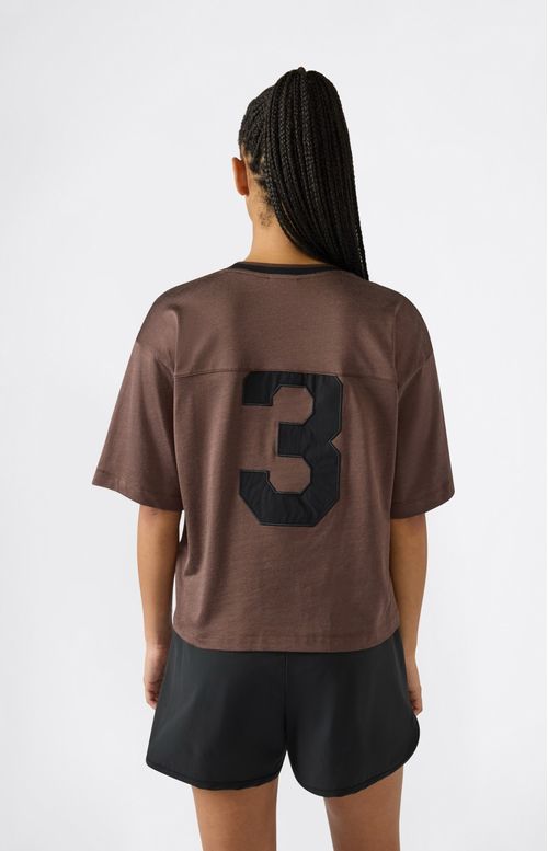Remera de cuello redondo con gráfico numérico para mujer